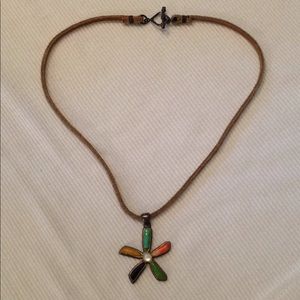 Sterling silver flower pendant on leather necklace